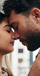 Love, home and couple with forehead touch for connection, safety and security with partner. Man, woman and romantic moment in house for marriage commitment, loyalty or trust with healthy relationship