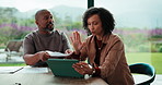 Argument, paperwork and couple with tablet in home, bankruptcy crisis and online banking to pay bills. Angry partner, mature and African people with fight for tax invoice, tech or review account debt