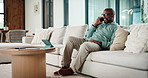 Man, discussion and remote work in home with phone call, proposal and feedback for insurance premium. Mature, black person and freelancer talk in living room with tech, contact and update for policy.