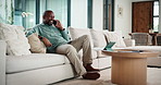 Man, discussion and remote work in house with phone call, glasses and feedback for insurance premium. Mature, black person and freelancer talk in living room with tech, contact and update for policy.
