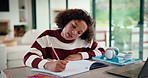 Child, writing and elearning in house with laptop, worksheet question or problem solving for math task. Girl, notes and thinking in home with computer, online education and knowledge for numeracy.