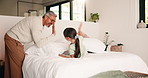 High five, bedroom and dad with children with pillow fight for bonding, playful fun and weekend. Family, happy and boy with girl on bed for laughing, energy and playing together in home with father