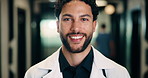 Face, man and doctor with pride for healthcare, confidence and wellness career in hallway. Smile, physician or medical professional with portrait for about us, management and support in clinic