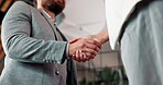 Realtor, greeting or people in office with handshake, intro and deal closed in agreement. Hello, below or real estate agents with shaking hands, property exchange or success in investment negotiation