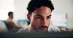 Man, reading and research in office with computer, editing logo design and online marketing project. Coworking, creative person and graphic designer in business with pc, campaign review and planning.