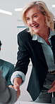 Meeting, handshake or businesswoman with smile in office, investment contract or financial partnership. B2b, deal negotiation or manager shaking hands with client, agreement or venture collaboration