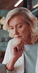 Creative, thinking and businesswoman with laptop in office, copywriting and planning for ad campaign. Copywriter, online and mature person with ideas, serious or email marketing with tech in business