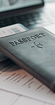 Passport, ticket and laptop for online booking, immigration or web registration with travel. Document, ID and computer for airport info or FAQ with application, flight schedule or trip confirmation