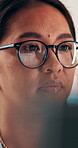 Creative, glasses and businesswoman with laptop in office, copywriter or proofreading article on web. Serious, copywriting and person with tech for blog post, online and email marketing with eyewear