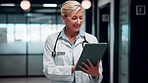 Doctor, woman and smile in hospital with tablet, patient medical history or good news for test results. Happy, mature person or healthcare worker scroll with tech, website or research for telehealth.
