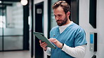 Nurse, man and typing in hospital with tablet, research patient medical history and online test results. Healthcare worker, person and browsing in clinic with tech, telehealth website and diagnosis.