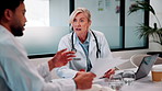 Paperwork, doctors and talking in meeting for healthcare review, treatment planning and results. Medical, man and woman with document for clinic schedule, laptop and team with patient history