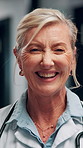 Happy, woman and face of doctor in hospital with confidence for career in medical service. Smile, professional and portrait of mature female healthcare worker with pride for about us in clinic.