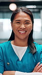 Happy, woman and face of nurse in hospital with confidence for career in medical service. Smile, professional and portrait of Asian female healthcare worker with pride for about us in clinic.