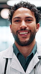 Smile, man and face of doctor in hospital with confidence for career in medical service. Happy, professional and portrait of male healthcare worker with pride for about us at clinic in Mexico.