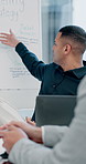 Man, presentation and staff at office meeting with whiteboard, notes and point at marketing company. Business people, review and mindmap for strategy, research and development with planning at agency