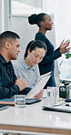 Boardroom, meeting and business people with documents for finance review, budget and investment. Corporate, whiteboard and workers for financial report, proposal and discussion for presentation
