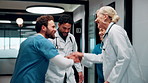 Applause, hospital and doctors with nurses for stack of hands with collaboration, unity and solidarity. Happy, people and group of healthcare employees in circle for team or medical support in clinic