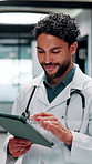 Reading, doctor and man with tablet in hospital, medical journal and email for healthcare newsletter. Review, research and physician with ebook on clinical diagnosis, tech and smile for telehealth