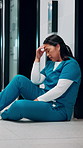 Stress, hallway and nurse with mistake in hospital for patient loss, surgery fail or crisis on floor. Healthcare, thinking and woman with worry, guilt and regret for medical service, burnout or error