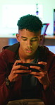 Man, gaming and frustrated with phone in living room for challenge, loss or mistake reaction. Stress, fail and annoyed with mobile app for teenager, gamer and difficulty with esports defeat in home