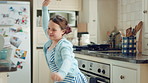 Child, dancing and excited in home kitchen with energy, childhood and spin in dress with wellness. Girl kid, happy dancer and freedom with development, play and growth with movement in family house