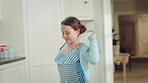 Dancing, home and child in kitchen with energy, running or creative performance with music. Spinning, happy and girl grooving to radio or playlist with choreography, growth and development in house.
