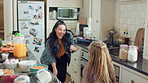 Mom, child and dance in kitchen with music, wooden spoon and bonding together for fun weekend break. Happy, woman and young daughter play in home with family connection, support or movement for song.