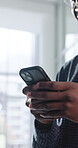 Hands, man and texting with phone in office for client email, tracking market and finance platform. Financial advisor, typing or mobile app at workplace to monitor portfolio, economy news or research