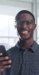 Happy, face and businessman with phone in office, positive feedback and campaign results on website. Creative, copywriting and black person with mobile for ad review, smile and confident in Nigeria