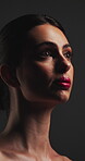 Beauty, thinking and lip gloss in studio for cosmetics, self care and makeup for glow or shine. Gray background, color lipstick and body wellness of person with cosmetology, shadow and pigmentation