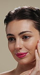 Thinking, skincare and woman with cosmetics for beauty, natural aesthetic and wellness glow for self care. Reflection, smile and person with dermatology for healthy skin, makeup and studio background