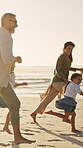 Parents, children and running at beach with race on vacation, play and bonding for love in summer. Happy people, laugh and girl kids with fun, excited and holding hands with games on family holiday