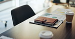 Empty, chart and desk with documents in office for finance meeting with graphs, proposal and report. Corporate space, business and coffee with paperwork, notebook and workplace for financial review