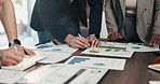 Documents, hands and business people in meeting with writing, data analysis and tablet for planning. Team, collaboration and strategy in office with paperwork, tech and graphs for statistics notes.