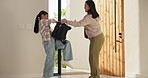 Mom, home and child with backpack for school, education and running with daughter in morning or rush. Fast, woman and help kid with bag, pack and getting ready to leave, student and mother in house