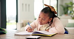 Homework, writing and child with notebook in home for learning, education and assessment. House, thinking and girl with pen for activity, assignment and lesson for studying, answer and development