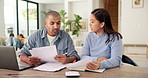 Frustrated, couple and laptop with documents for financial crisis, mistake or conflict in home. Upset, man and woman with paperwork or computer for finance dispute, bad credit or bankruptcy in house