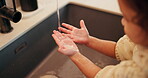 Tap, water and child washing hands in home for hygiene, wellness and learning by sink. Bathroom, splash and kid with palms under liquid for cleaning, bacteria and germs with rinse and self care