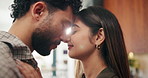 Happy couple, dancing and touch with forehead in kitchen with relationship, connection and love in home. People, partner and smile with rhythm, care or trust with movement for bonding at apartment