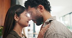 Couple, hug and touch with forehead in kitchen for relationship, connection and love in home. People, partner and smile with affection, profile or trust with embrace, loyalty or bonding at apartment