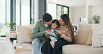 Parents, kid and tablet with game on sofa for problem solving, development or bonding activity. Learning, family and child with tech in home for playing online puzzle, growth support and relationship