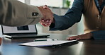 Business, signature and people shaking hands in office for hiring, agreement or recruitment. Deal, handshake and recruiter with woman writing on paper for job offer, contract and success in meeting