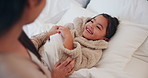 Laughing, mother and tickle child in bed for morning fun, bonding together or healthy relationship. Funny, mom and daughter with playing in bedroom for connection, happy family or development in home