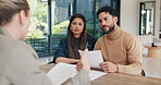 Financial advisor, meeting and document with couple in home together for budget review or debt planning. Paperwork, conversation and bad news with people in house for finance or wealth management