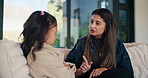 Angry, mother or child on couch with scolding, teaching moment or parent warning in conflict. Argument, childcare or family in home with pointing, discipline or lesson in behavioural correction.