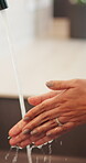 Health, water or person in house with hand washing, bacteria removal or sanitation in wellness routine. Safety, cleansing or woman with stream, germ protection or hygiene habit in virus prevention.