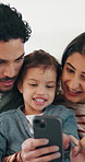 Parents, child and talk in home with phone, play educational game and bonding together on weekend. Happy people, mother and father in family house with daughter, tech and learning with kids app.