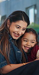 Hug, card and mom with child in home with gift for relationship, bonding and affection. Family, happy and woman with girl with loving note for connection, love and embrace for mothers day in house