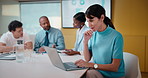 Finance, laptop and thinking with woman in meeting for review of data charts or statistics. Computer, graphs and typing with mature broker in boardroom of financial workplace for investment planning